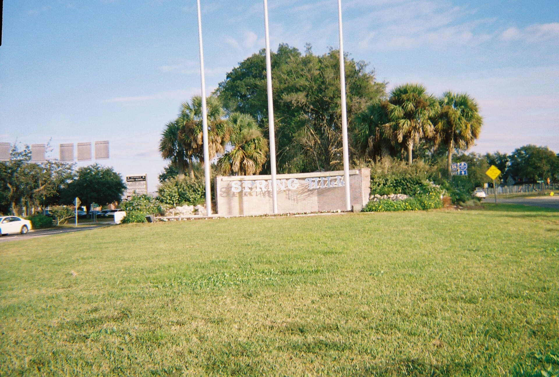 Weeki Wachee Springs State Park entrance with the iconic mermaid statue and crystal-clear spring water