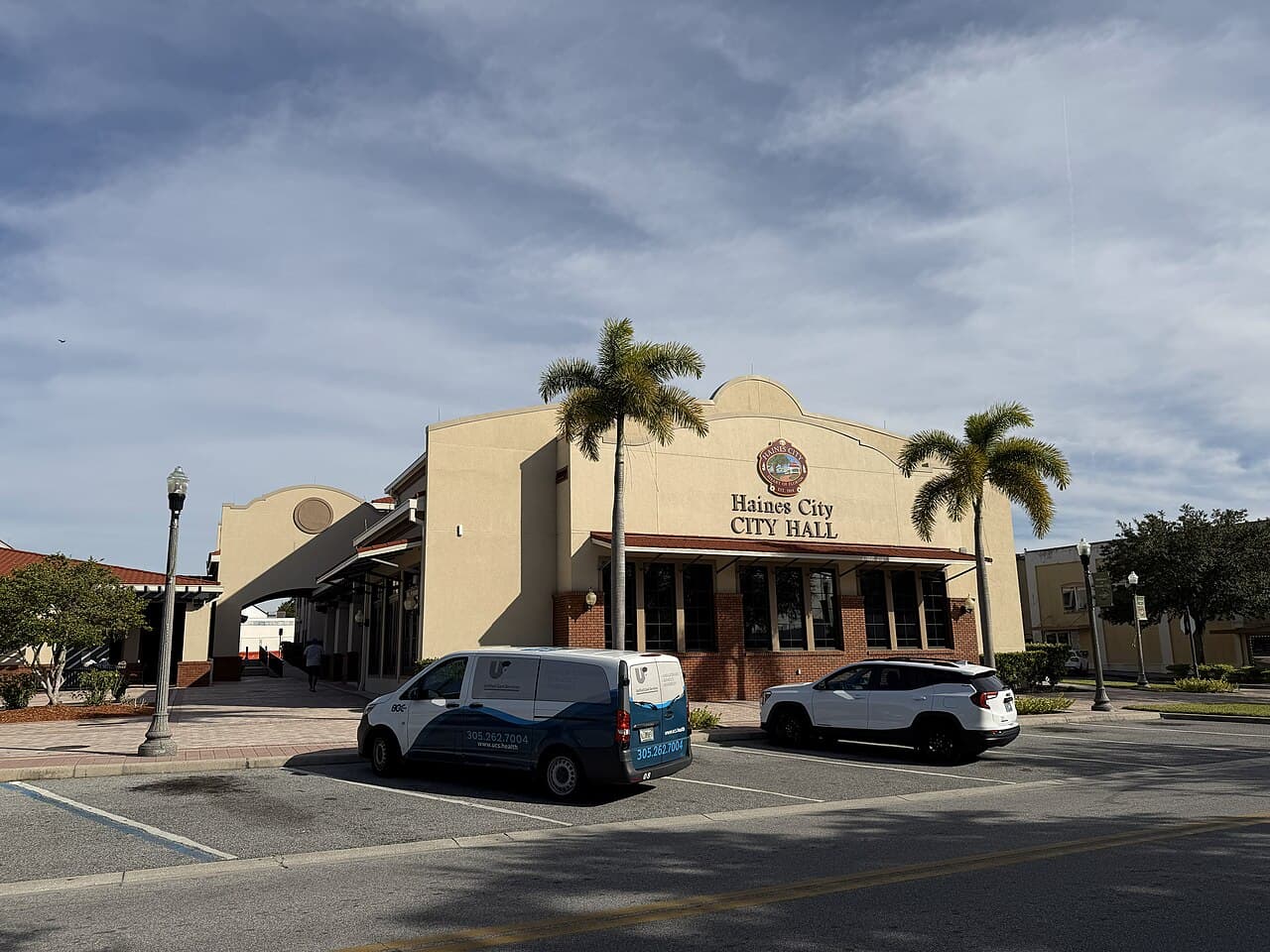 Residential neighborhood in Haines City Florida with palm trees and new construction homes